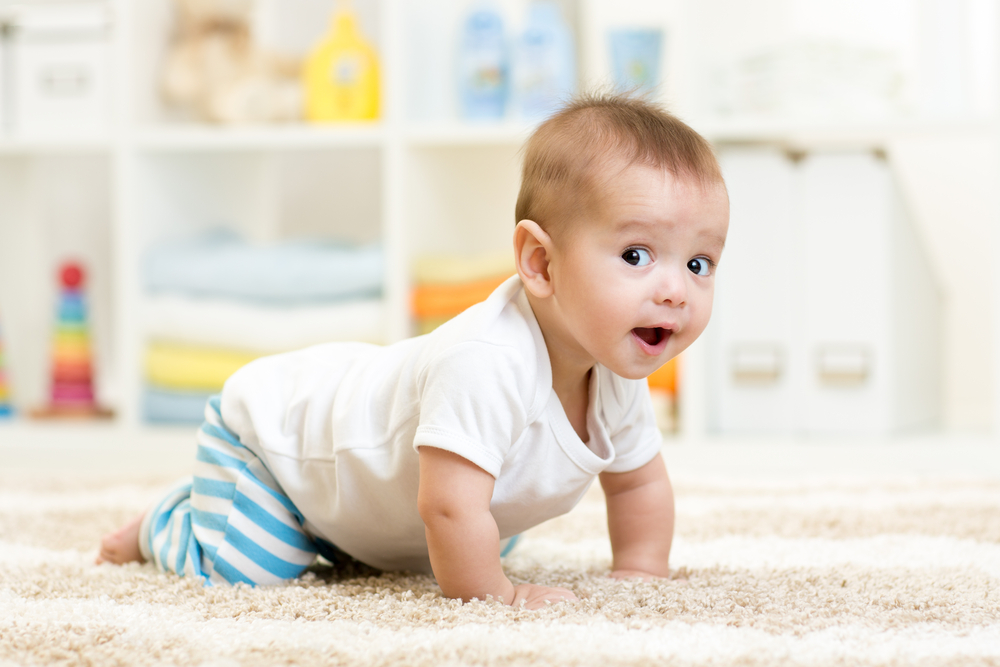 Babies crawl, scoot and shuffle when learning to move. Here’s what to watch for if you’re worried